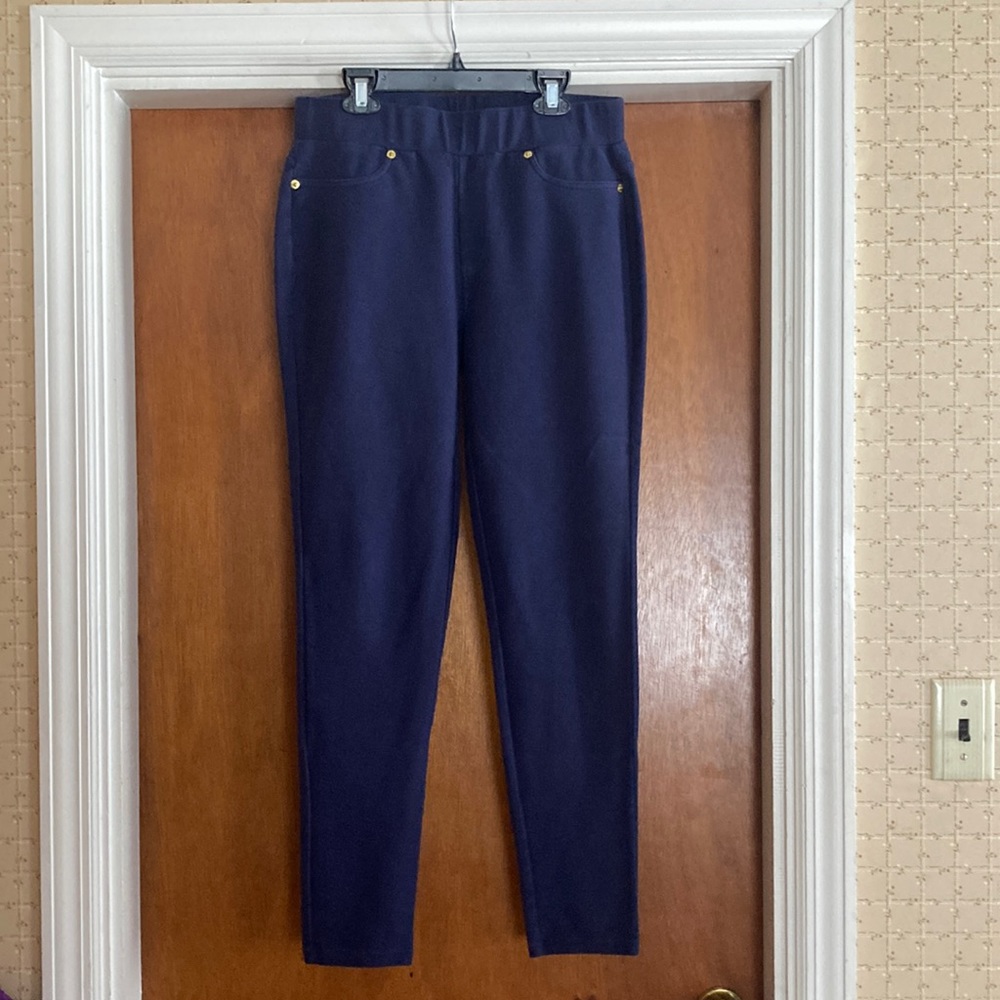 Michael Kors size M navy legging. Fake front pockets, real back pockets.